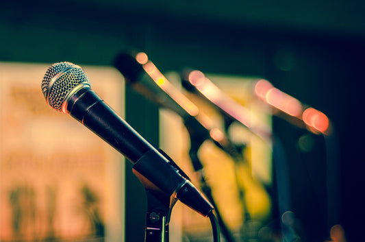 Why would you use a microphone on a speaker?