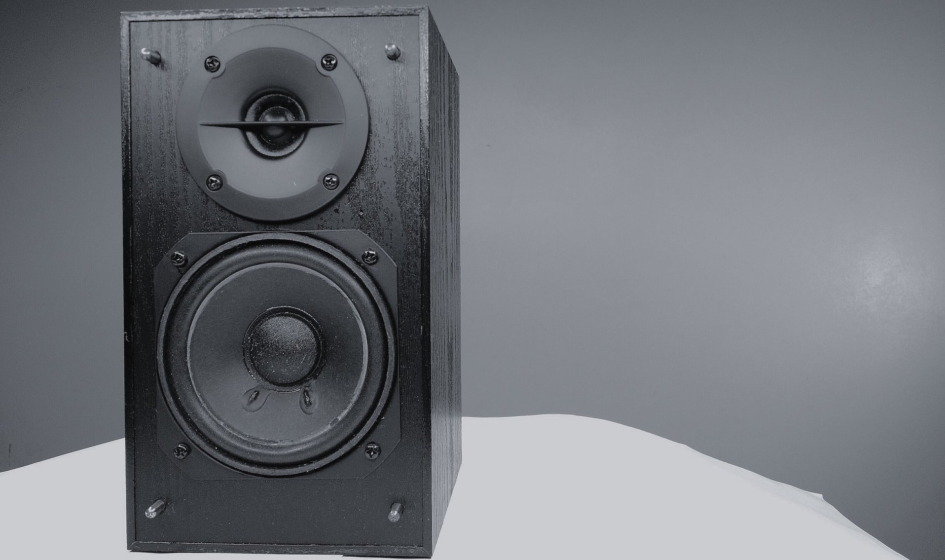 Are box speakers better than in-wall?