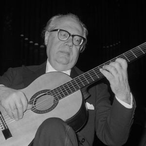 Andrés Segovia breaking in a guitar the old-fashioned way in 1962.