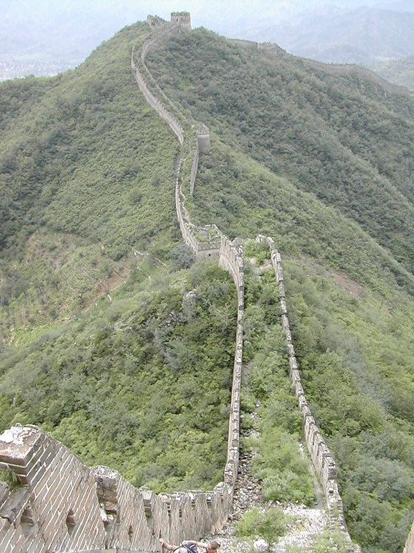 The wall runs along mountain ridge lines for 13,000 miles!