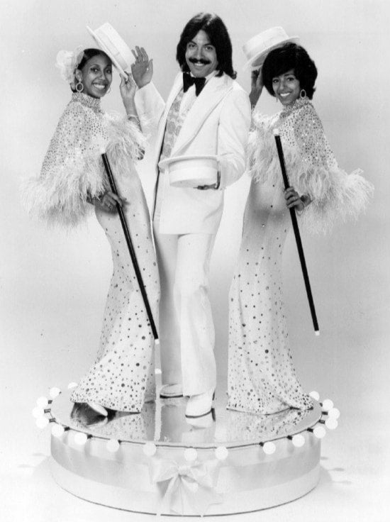 Knock three times if you remember who this is! Tony Orlando surrounded by Dawn: Telma Hopkins and Joyce Vincent Wilson, 1974.