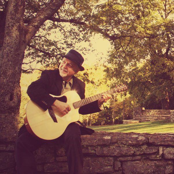 Phil Keaggy playing a McPherson guitar. From the McPherson website.