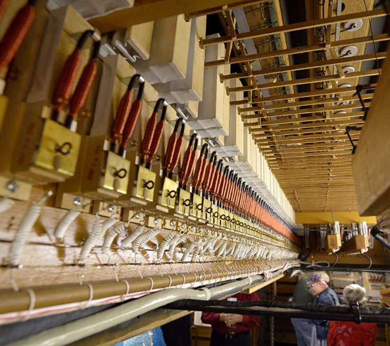 The electro-pneumatic relay system controls the stops and routes air to the appropriate pipes as the organ console keys are pressed. 