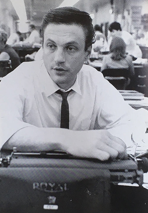 John at his typewriter in the Chronicle newsroom, 1966. Photo by Bill Young.