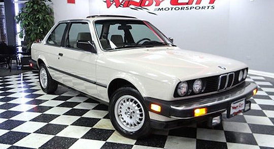 1985 BMW 325e in Gazelle Beige, which is the color of road dirt. Don’t lean on it, or you’ll get a big surprise. It had a cockpit that felt like a fighter jet and crazy performance off the line. It also got 38 miles per gallon! https://germancarsforsaleblog.com/