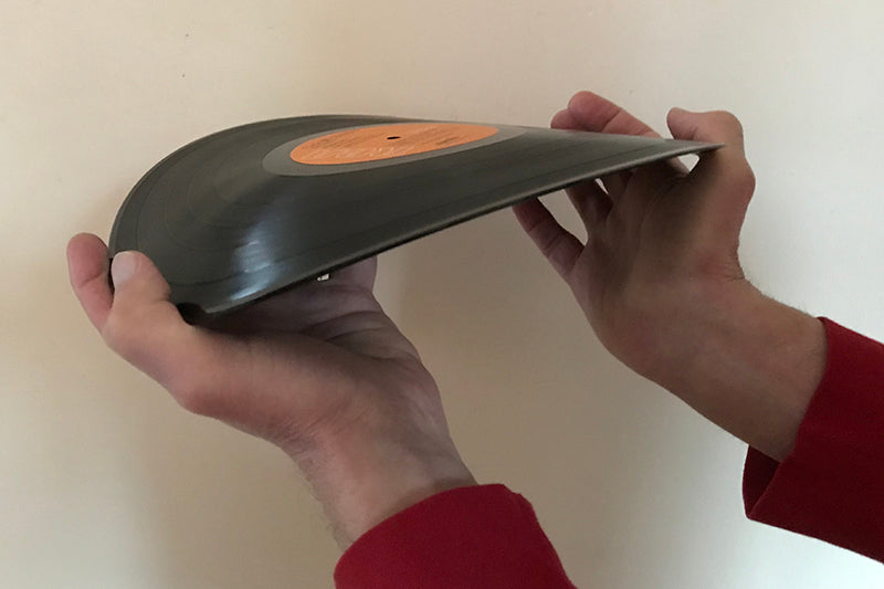 Bent out of shape: our editor demonstrates the flimsiness of a 1974 RCA Dynaflex record.
