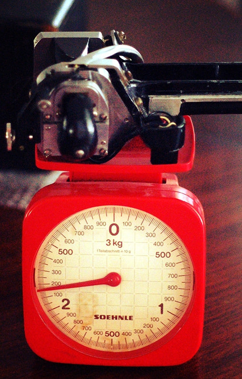 The Westrex 2B cutter head on a kitchen scale, to prove the point: It is a heavy beast. Courtesy of Agnew Analog Reference Instruments.