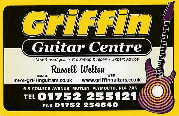 Russ Welton's calling card from his retail store days. Note the hole in the guitar which allowed it to be used as a hang tag!
