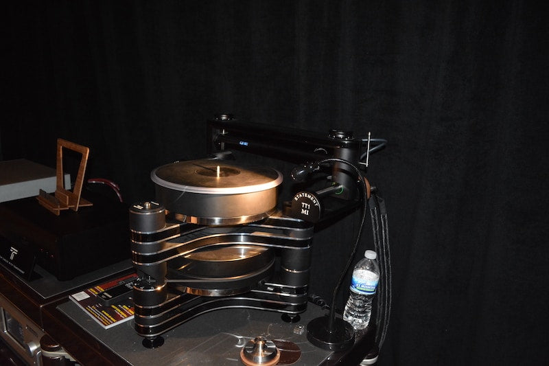 The Clearaudio turntable setup in one of the Quintessence Audio rooms. Keep the cap on that water bottle!