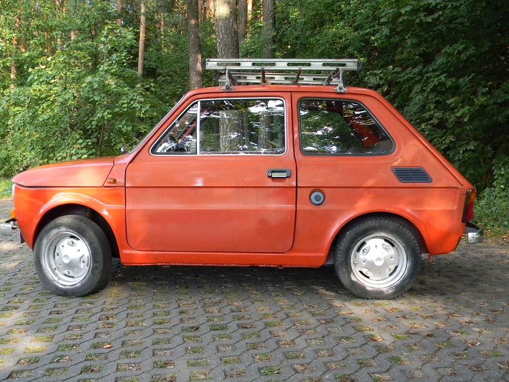 Before upgrading to the Skoda, Jedrzej's daily driver was this 1977 Polski Fiat 126 P, underpowered by a 36 cubic inch (not a typo, this is 594 cc), 2-cylinder, air-cooled gasoline engine.