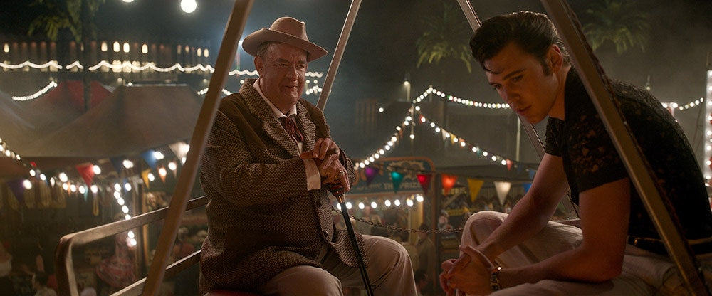 Tom Hanks as Colonel Tom Parker and Austin Butler as Elvis. Courtesy of Warner Bros. Pictures.