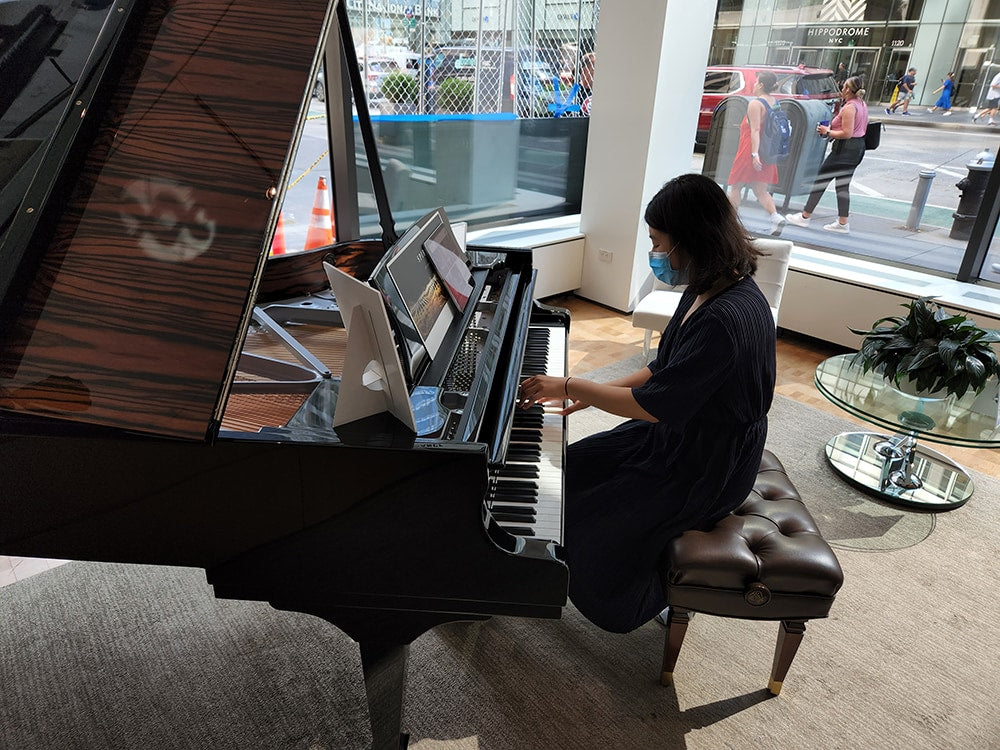 Yahan Liu playing the Spirio. Courtesy of Tom Methans.