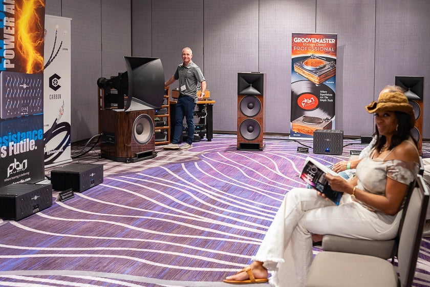 Lonny Gould of Kimber Kable demonstrates the PBN Audio system, which rocked the first floor. Those horns have presence! PBN Montana MR!X loudspeakers, Olympia EB-1 Super Amplifier, Groovemaster Vintage DIrect PBN-DN 308 turntable (salvaged from a Japanese broadcast station), Olympia PXIS preamplifier, Olympia LX/is line amp, and Kimber Kable Carbon XL cables.