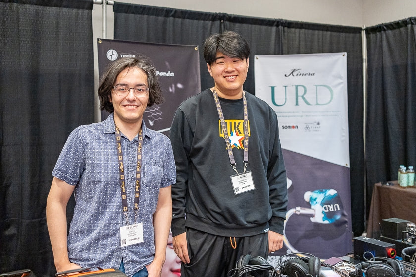 Neal Cha & Richard Zhang, Awedyo Audio. Their booth in T.H.E. Marketplace was popular with visitors, both for the equipment, and the offers of cold soda!