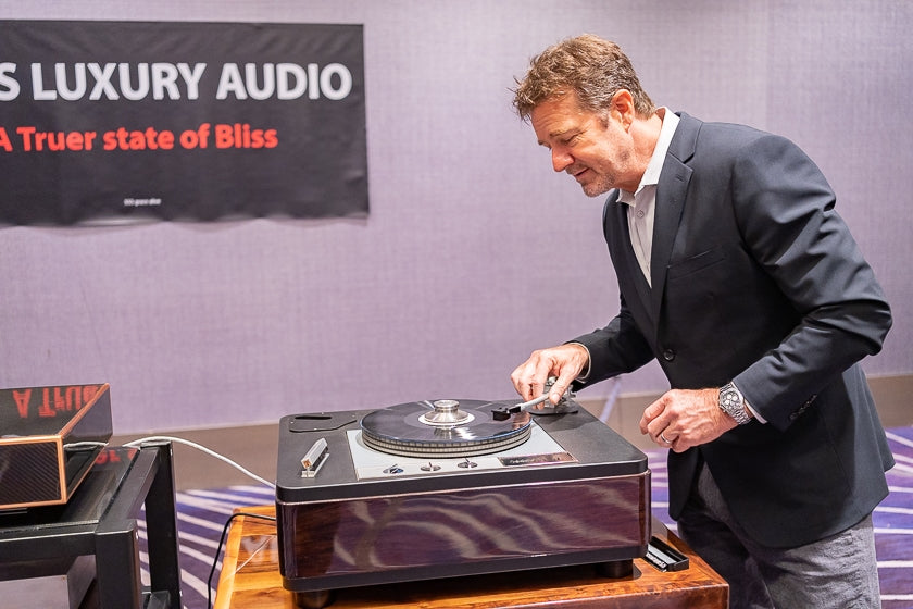 VOSS Luxury Audio's John Voss demonstrates a PBN Garrard 401 turntable in a PBN GrooveMaster plinth, with a Grado cartridge. The room also featured a Voss SK MAGNUM OPUS amplifier, VITRA linestage preamp and Reference phono stage, and PBN M3!5 speakers.