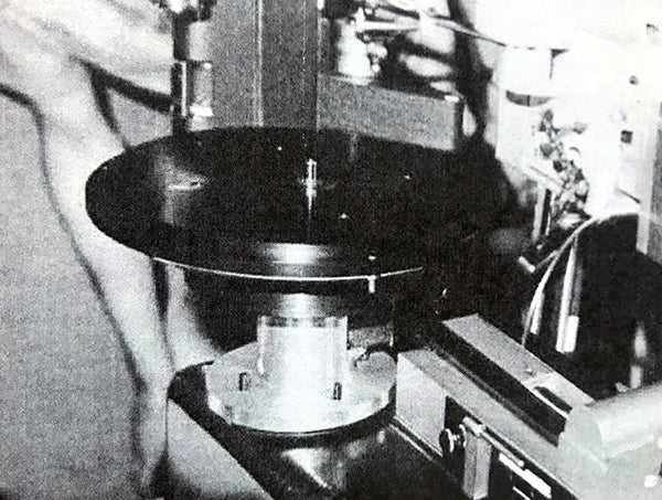 Above images: The Technics SP-02 was introduced as an aftermarket motor for the Neumann VMS-70 disk mastering lathe, intended to replace the Lyrec SM-8 synchronous AC motor that was originally used to drive the platter of the VMS-70. Unlike the SP-10, it was not a turntable. It was only the motor, designed to bolt directly onto the Neumann lathe bed, in place of the oil coupler (see Issues 157 and 159 for details), which had to be removed. It did not come with a platter. Instead, it was designed to support the massive Neumann vacuum platter. The drive electronics and control system were housed in an industrial-grade 19-inch rack mount enclosure. It was never offered as a standalone turntable or in versions that would be compatible with other disk mastering lathes. Only around 10-11 SP-02 units were ever made.