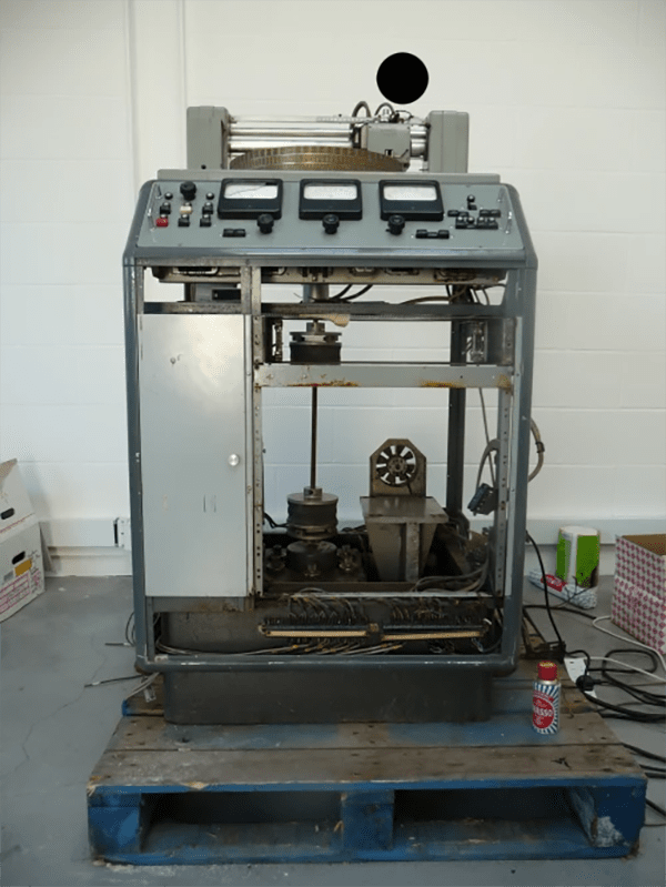 Lyrec lathe with the covers removed, making visible the drive shaft and motor below the platter. Courtesy of Electric Mastering.