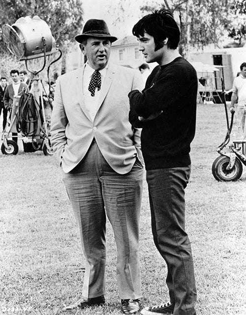 Colonel Tom Parker and Elvis Presley in 1969. Promotional photo courtesy of Wikipedia/pubic domain.