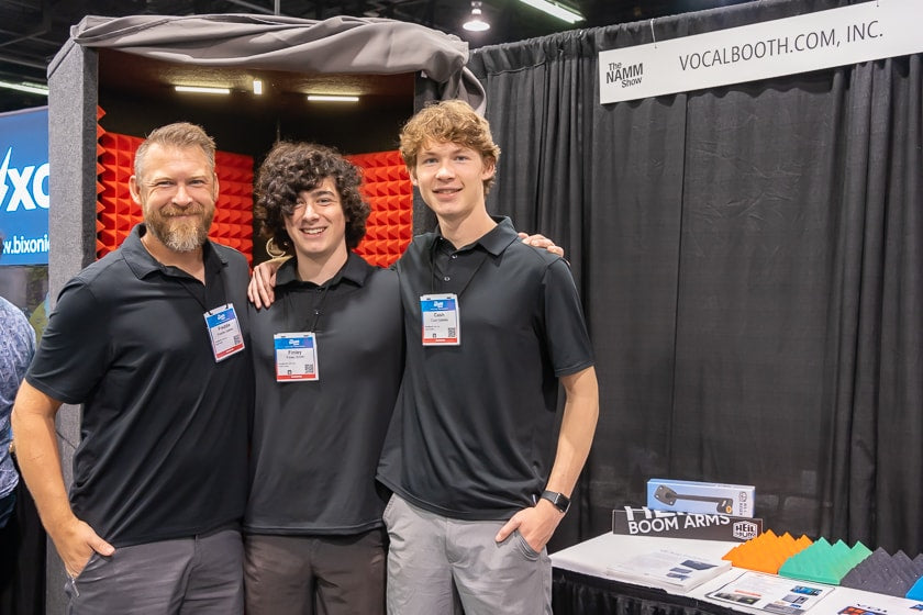 Freddie Gateley, Finley Smith and Cash Gateley of VocalBooth showing off their portable sound isolation booth. My wife Nancy suggested that I get one and use it when testing open-backed headphones. She also doesn’t appreciate my singing or humming either.