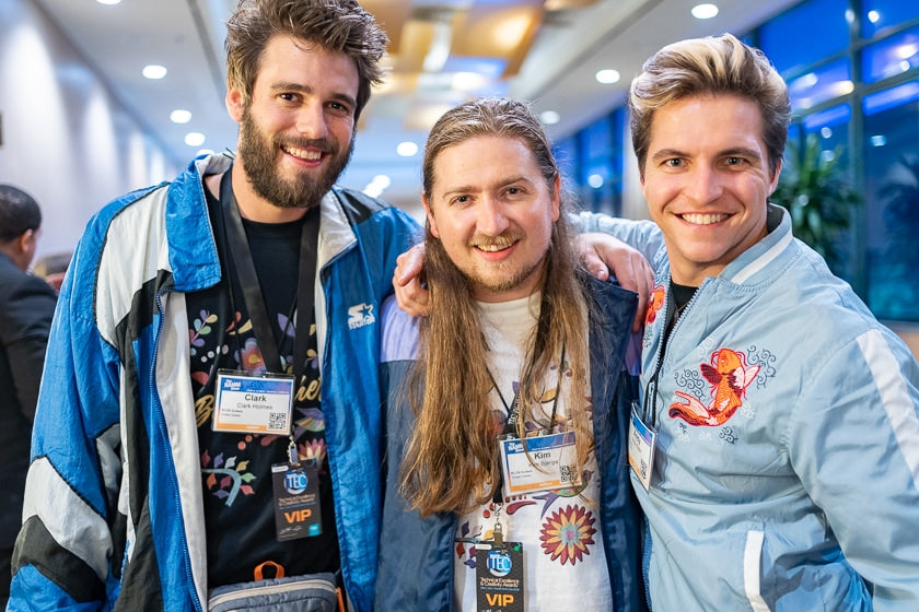 Clark Holmes, Kim Bjerga and Andy Nufer, of KLŌS Guitars, Provo, Utah, Their band, The Birdwatchers, was featured at NAMM, where they played the firm's carbon fiber instruments.