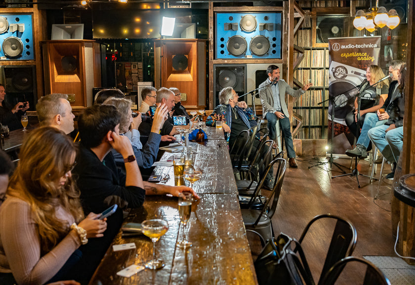 Moderator Justin Colletti (mastering engineer, educator and director of content and publishing at Sonic Scoop) on the mic. Photo courtesy of Harris Fogel.