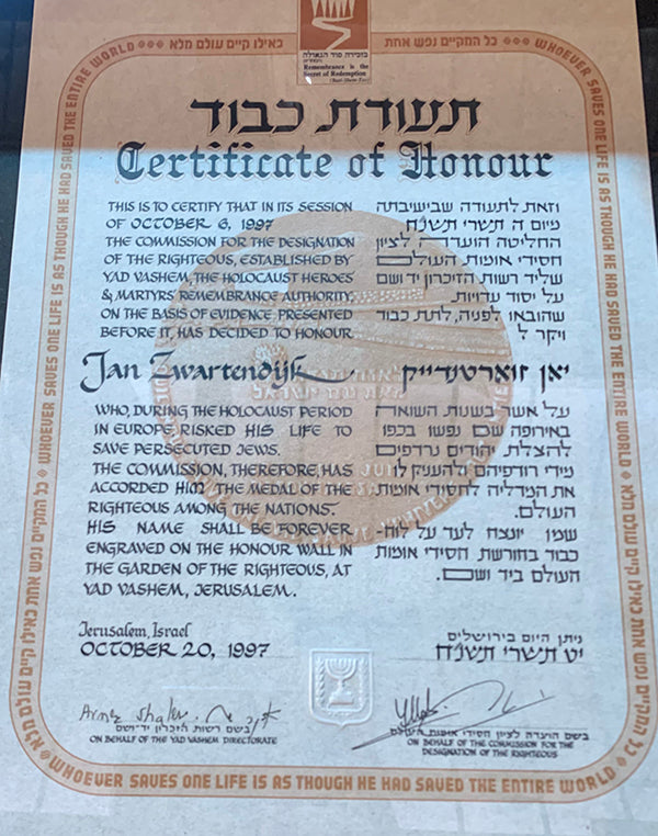 The Certificate of Honour given to Philips.